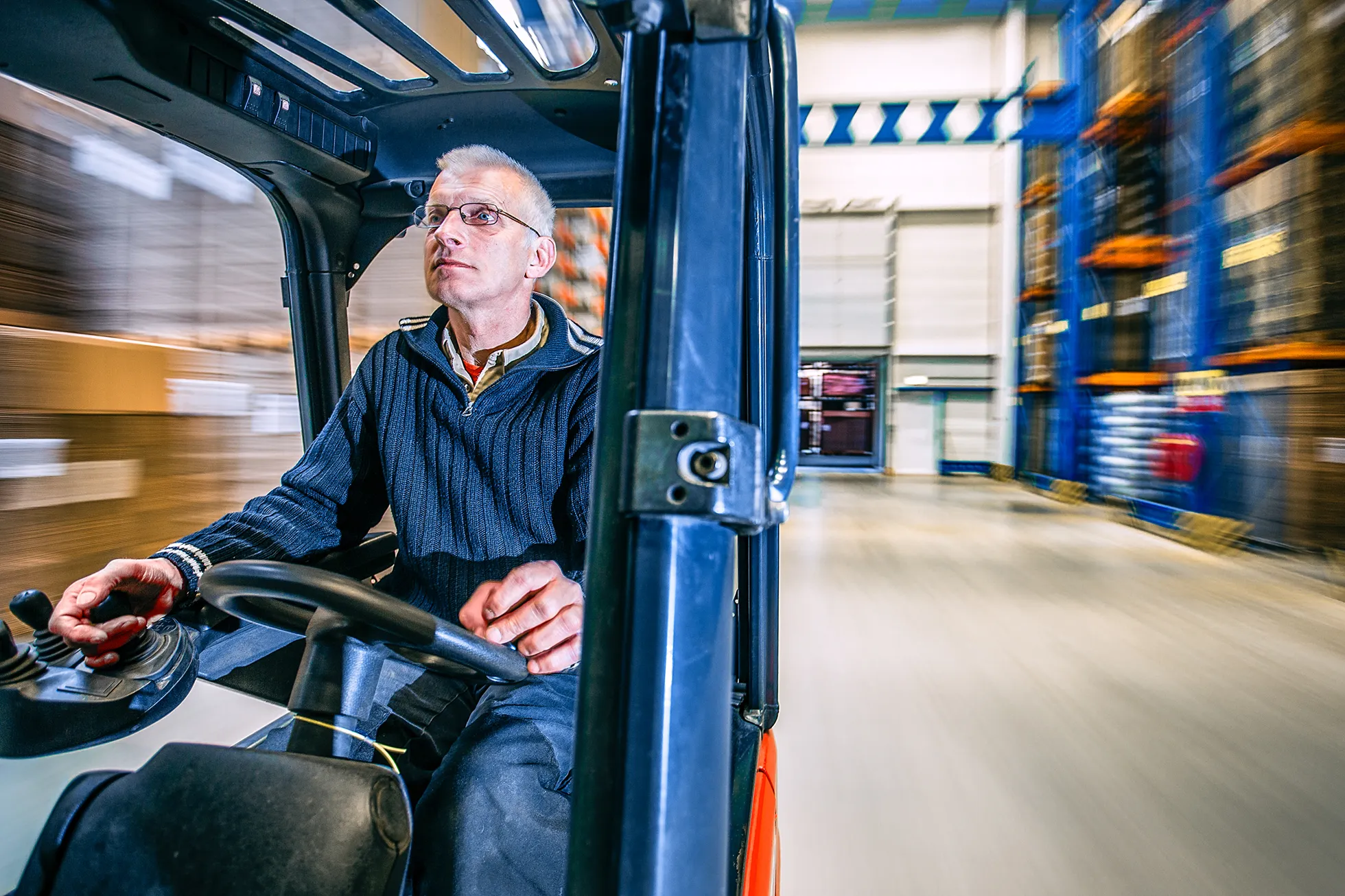 Man op heftruck